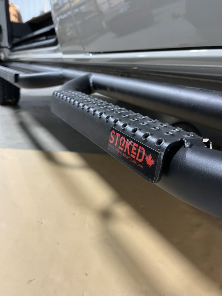 Heavy-duty exterior step on a Keystone van